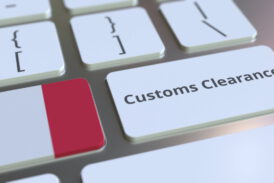 CUSTOMS CLEARANCE text and flag of France on the buttons on the computer keyboard. Import or export related conceptual 3D rendering